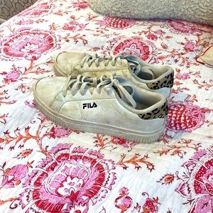 White fila sneakers with cheata print accents. Size womens   US 8 1/2.